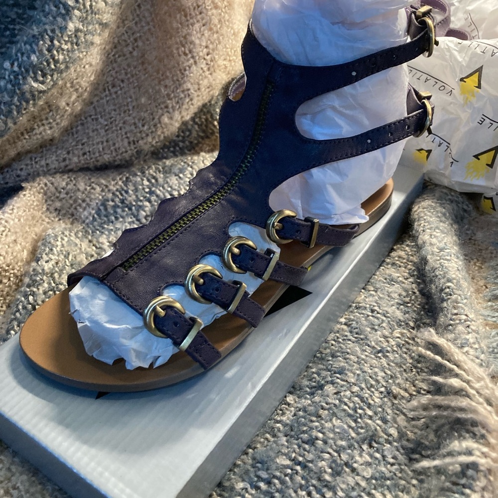 Volatile Purple Gladiator Sandals with Gold Accents